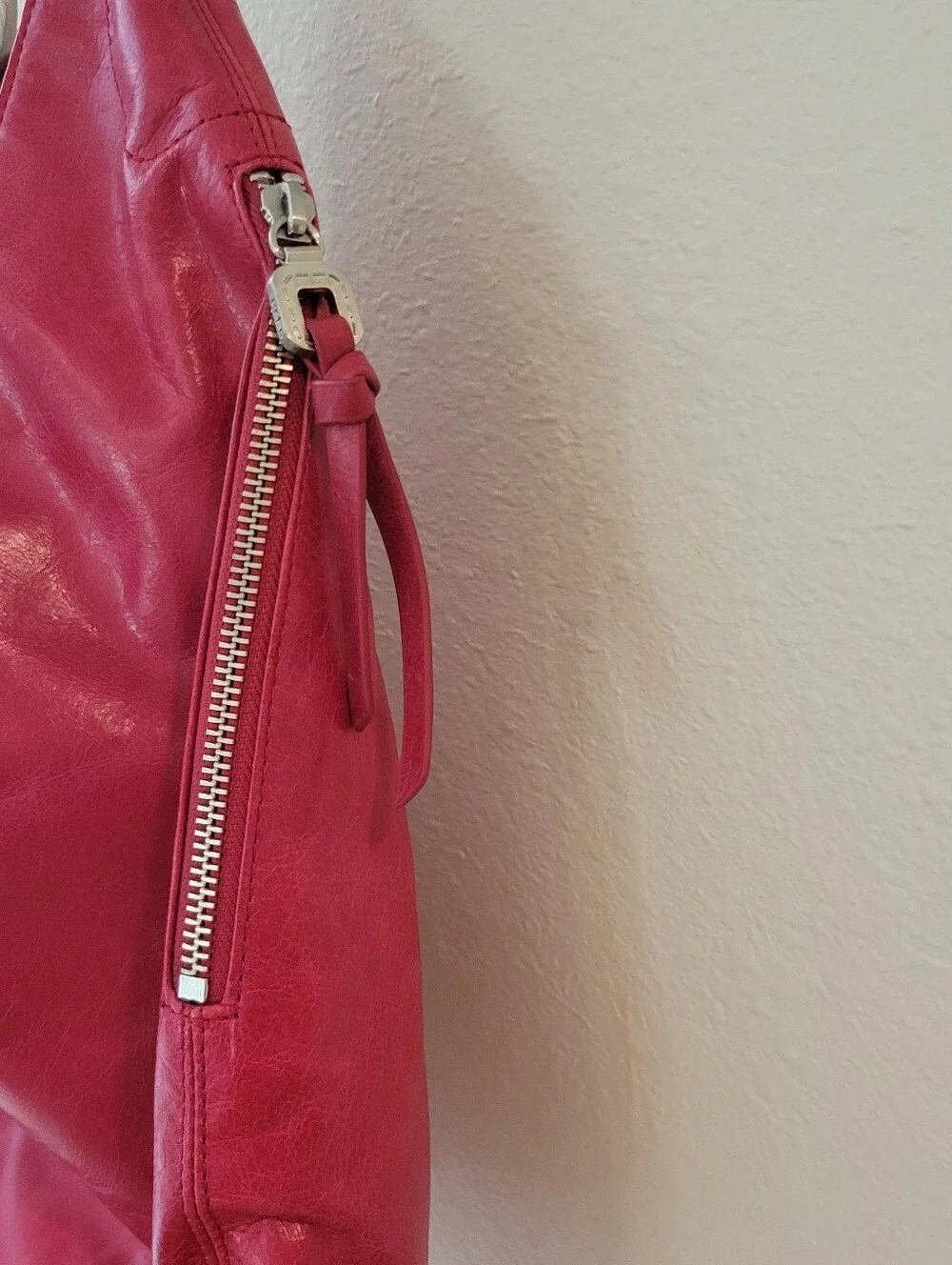 Hobo Women's Red Leather Shoulder Bag With 1 Strap, and Magnetic Close.